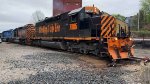 WE 7005 pulls her train out of Rock Cut Siding.